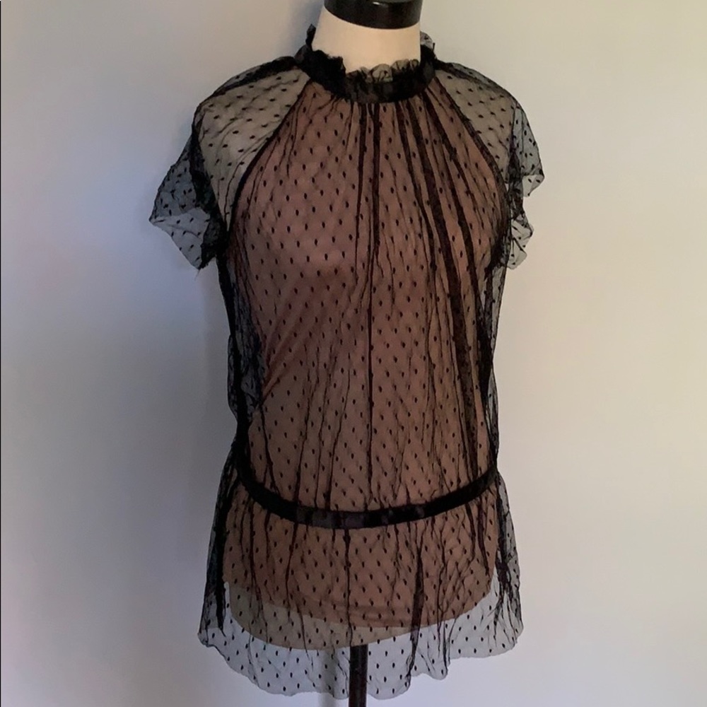 Nude and black mesh top